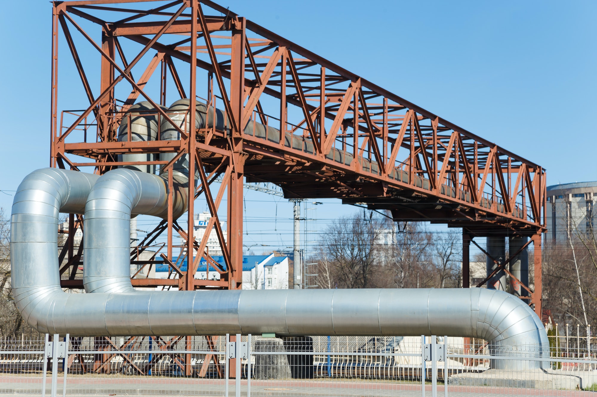 Industrial huge pipes on metal viaduct outdoor